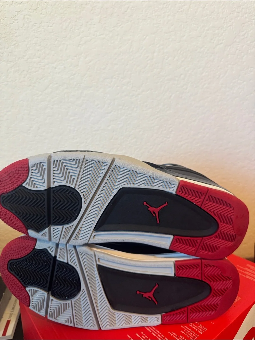 Jordan 4 RM Bred Men’s Black and Red Low-Top Sneakers